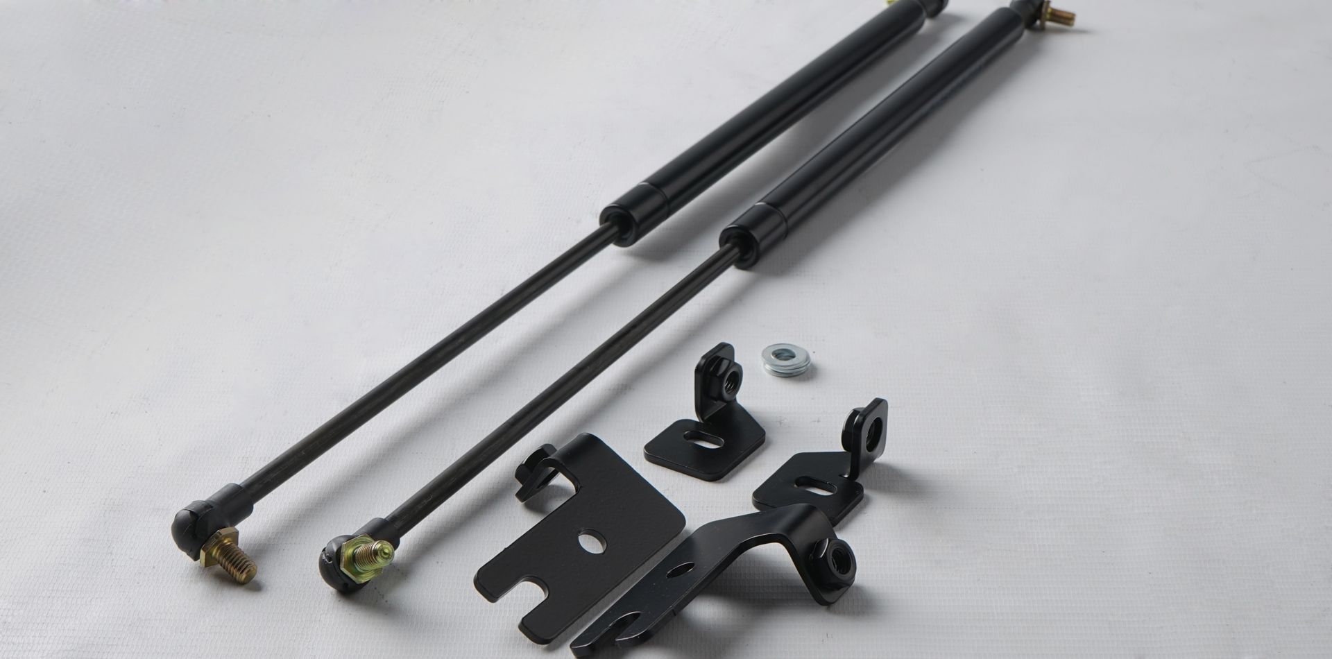 Development and production of bonnet shock absorbers